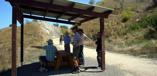 Visitors check out a trail-side shelter